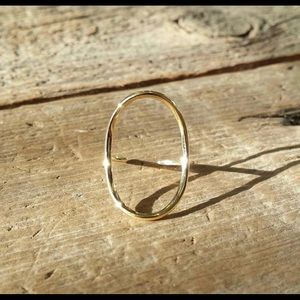 Gold oval ring.